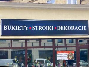 szyld sklepu z kwiatami