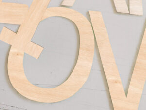 cutting out in plywood inscriptions milled in wood